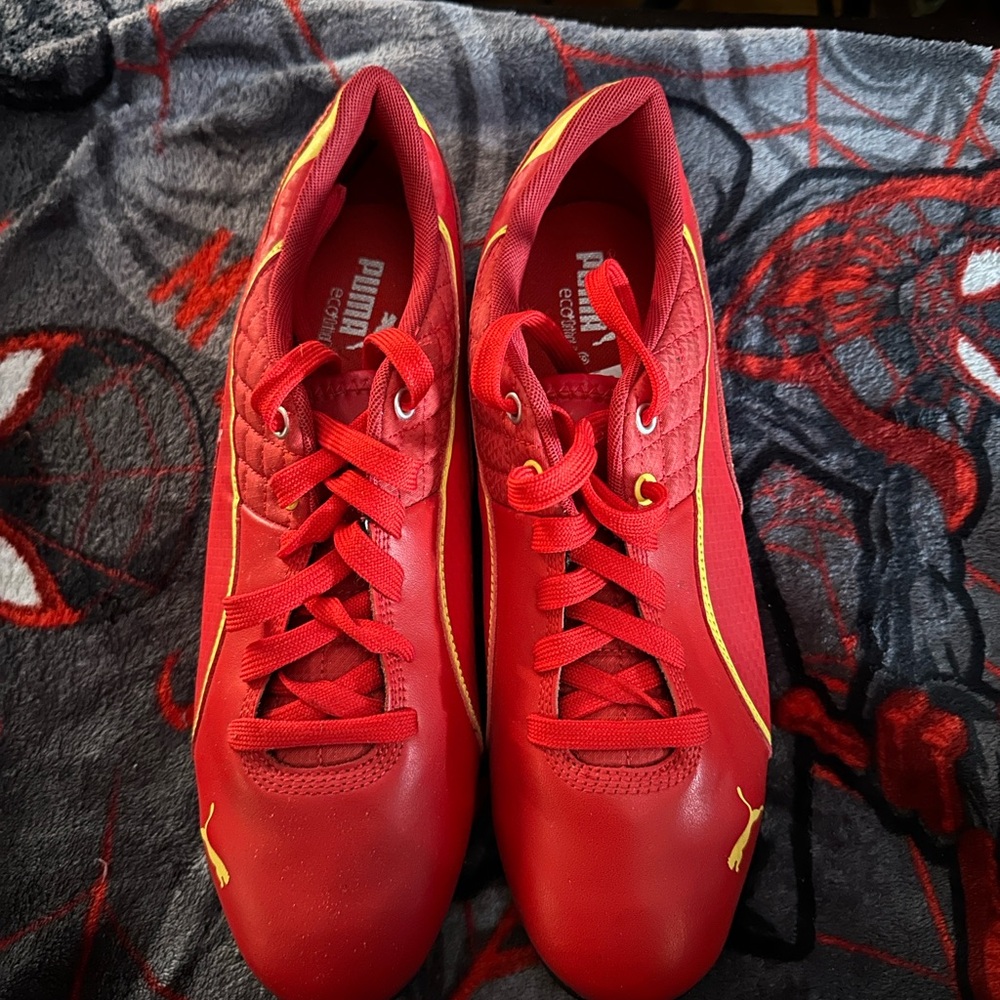Puma Men's Vibrant Red Athletic Shoes with Yellow Trim